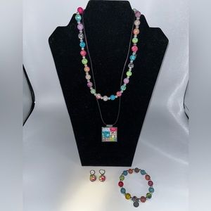Colorful bead and pendant necklaces with matching bracelet and earrings